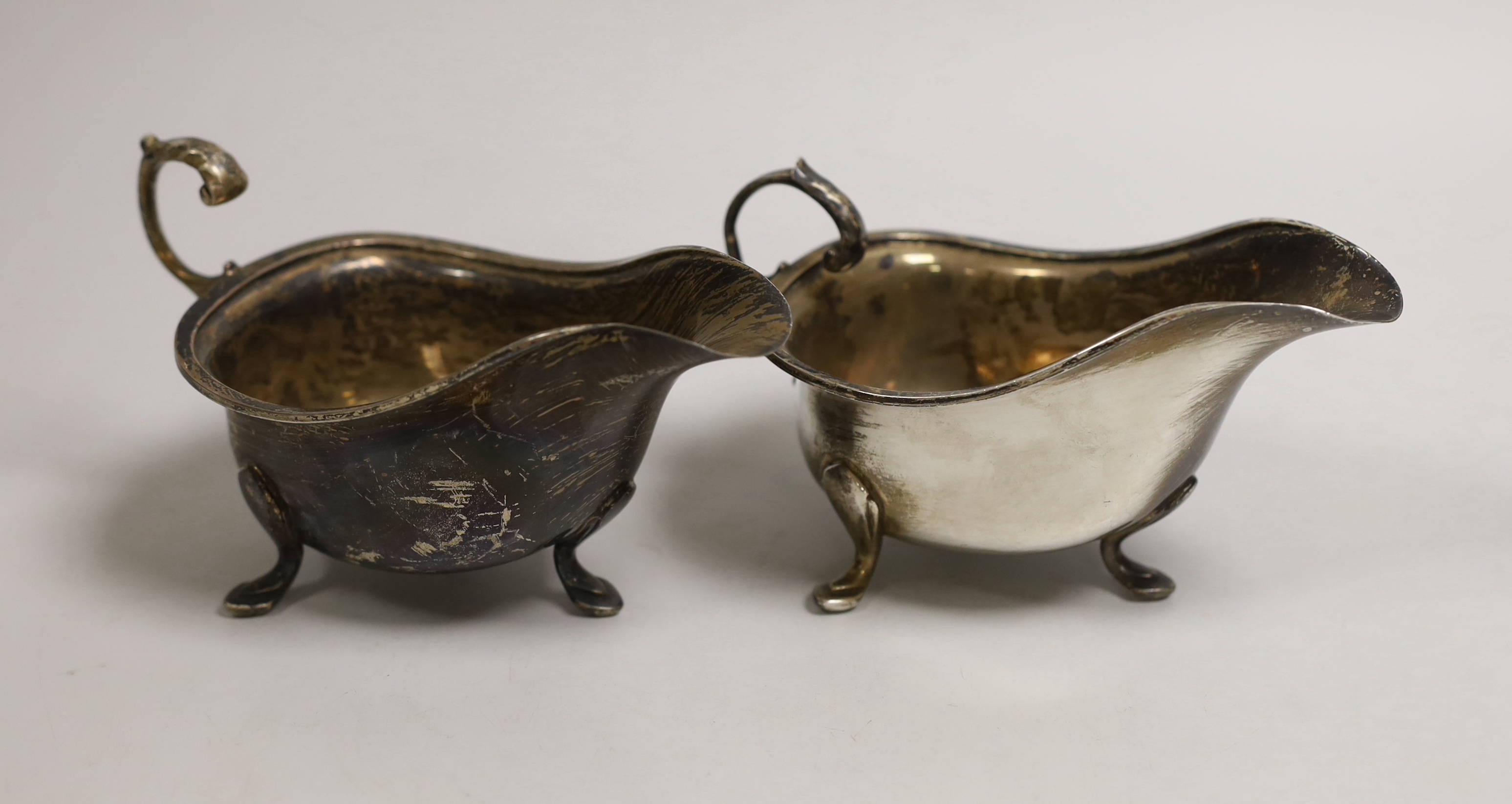 A pair of George VI silver sauce boats